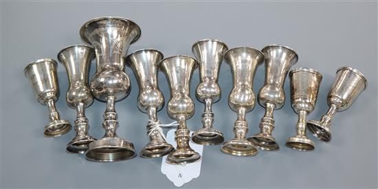 Eleven assorted silver kiddush cups,